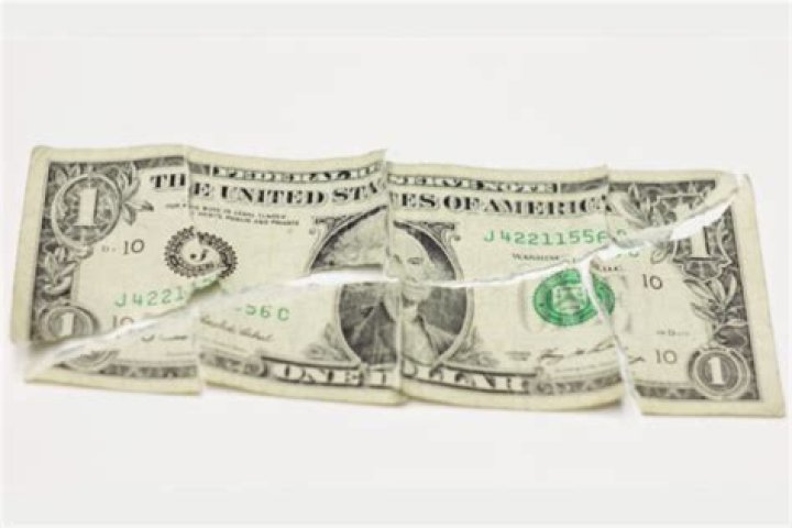 Can you exchange a ripped 100 dollar bill at the bank?