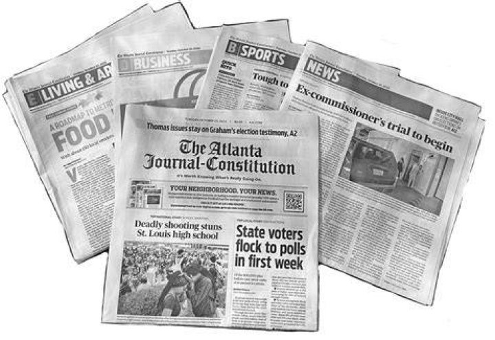 How do you carry newspaper?