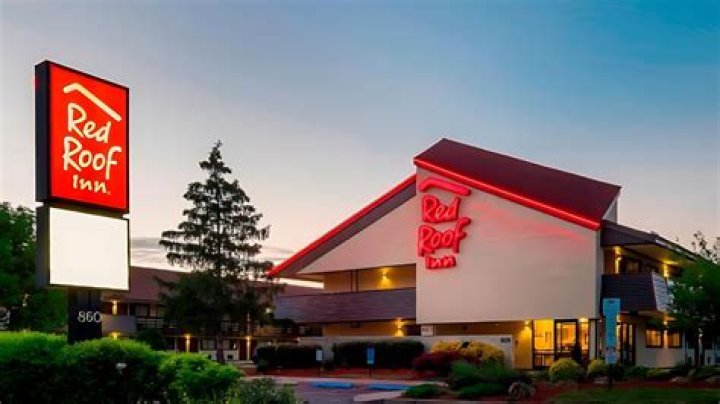 What company owns Red Roof Inn?