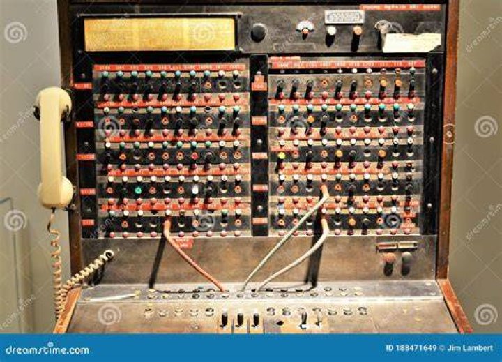 What is a telephone switchboard used for?