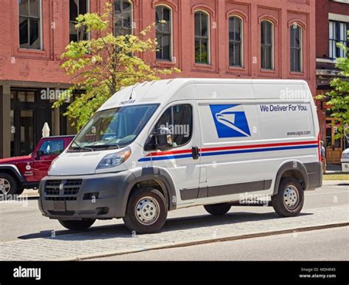 What mail carrier does Vans use?