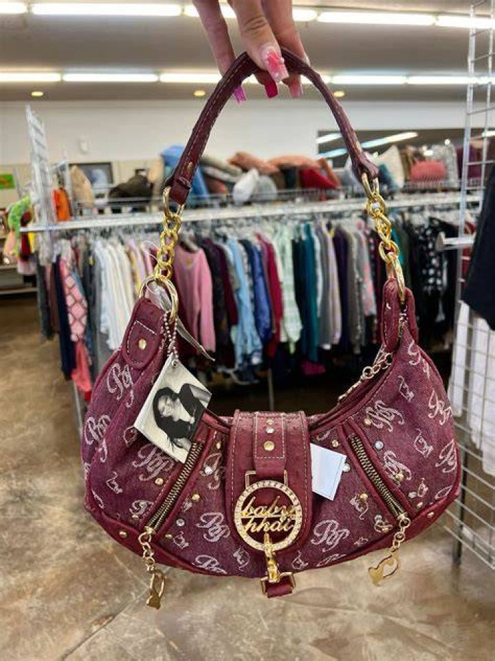 What store was Baby Phat sold in?