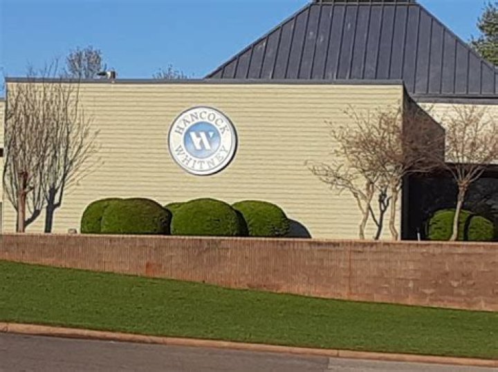What time does Whitney Bank Open?