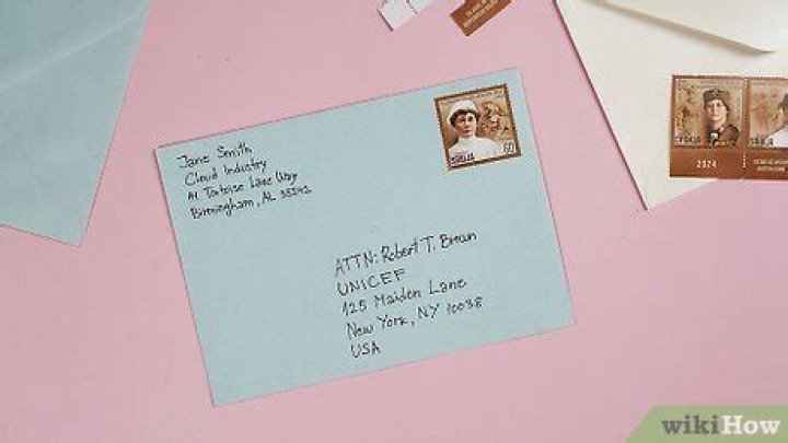 Where does the attention line go on a business envelope?